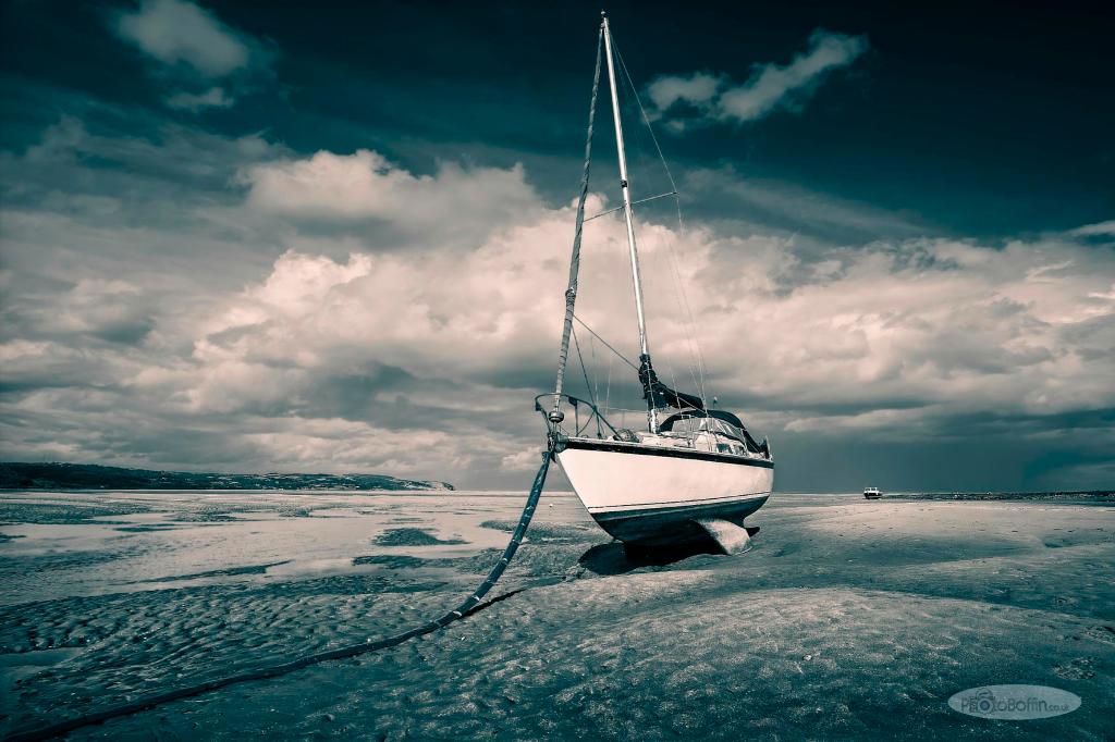 Boat and Beach at Red Wharf&nbsp;Bay